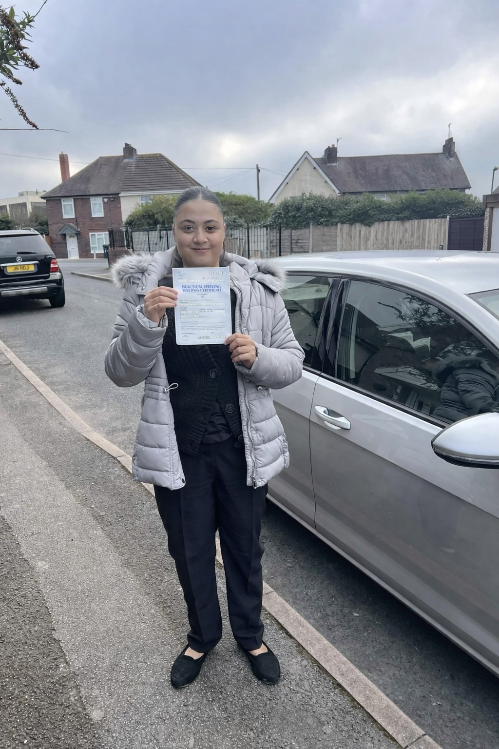Cars Driving School student celebrating a practical driving test pass
