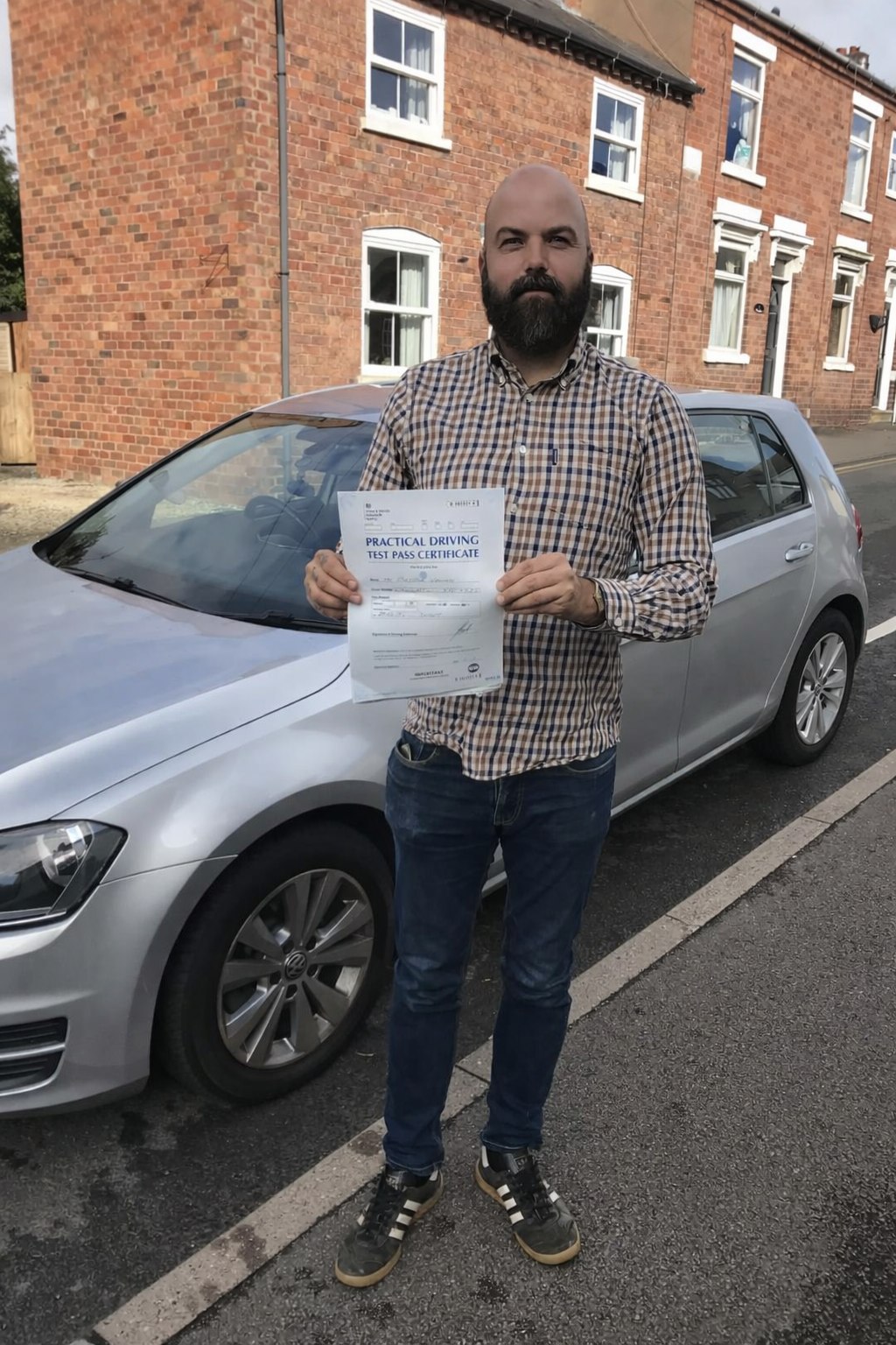 Cars Driving School student celebrating a practical driving test pass