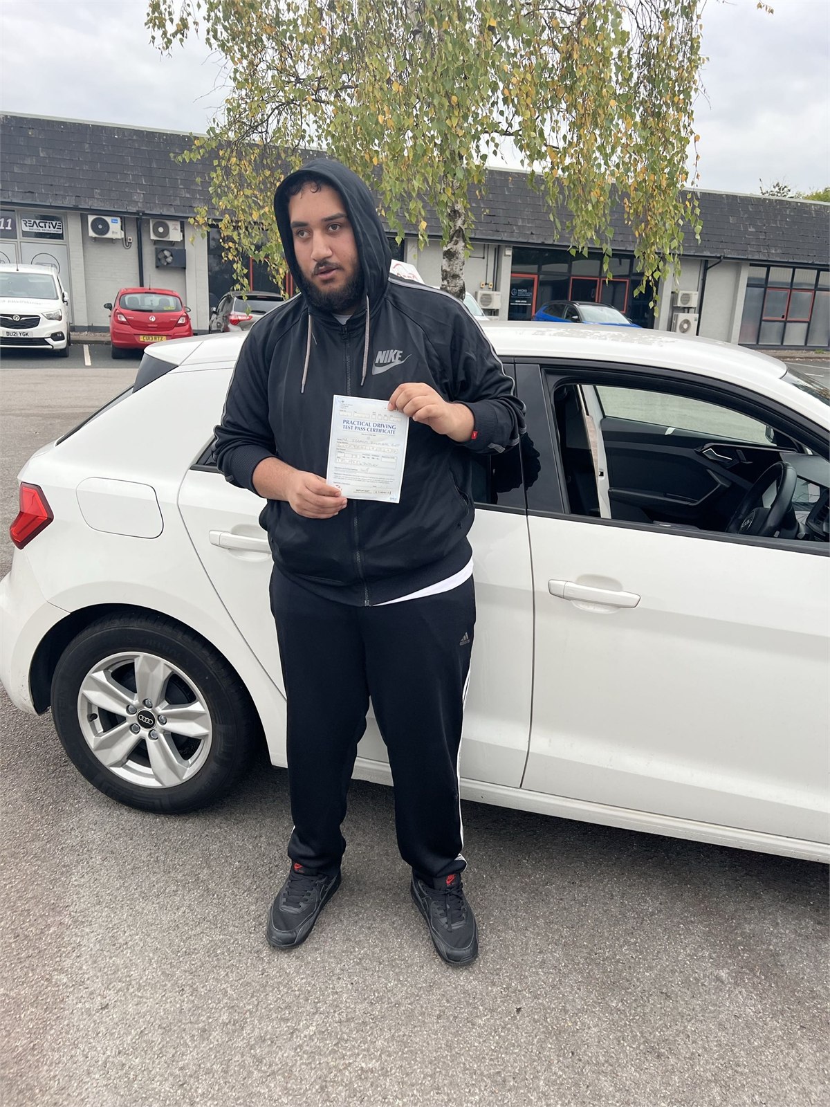 Cars Driving School student celebrating a practical driving test pass