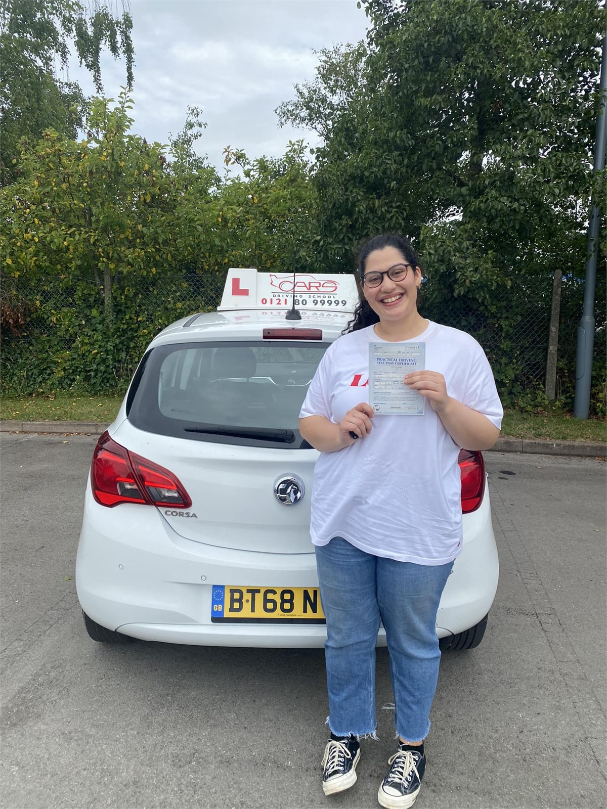 Cars Driving School student celebrating a practical driving test pass