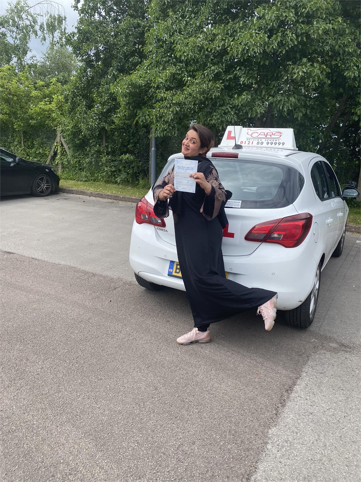 Cars Driving School student celebrating a practical driving test pass