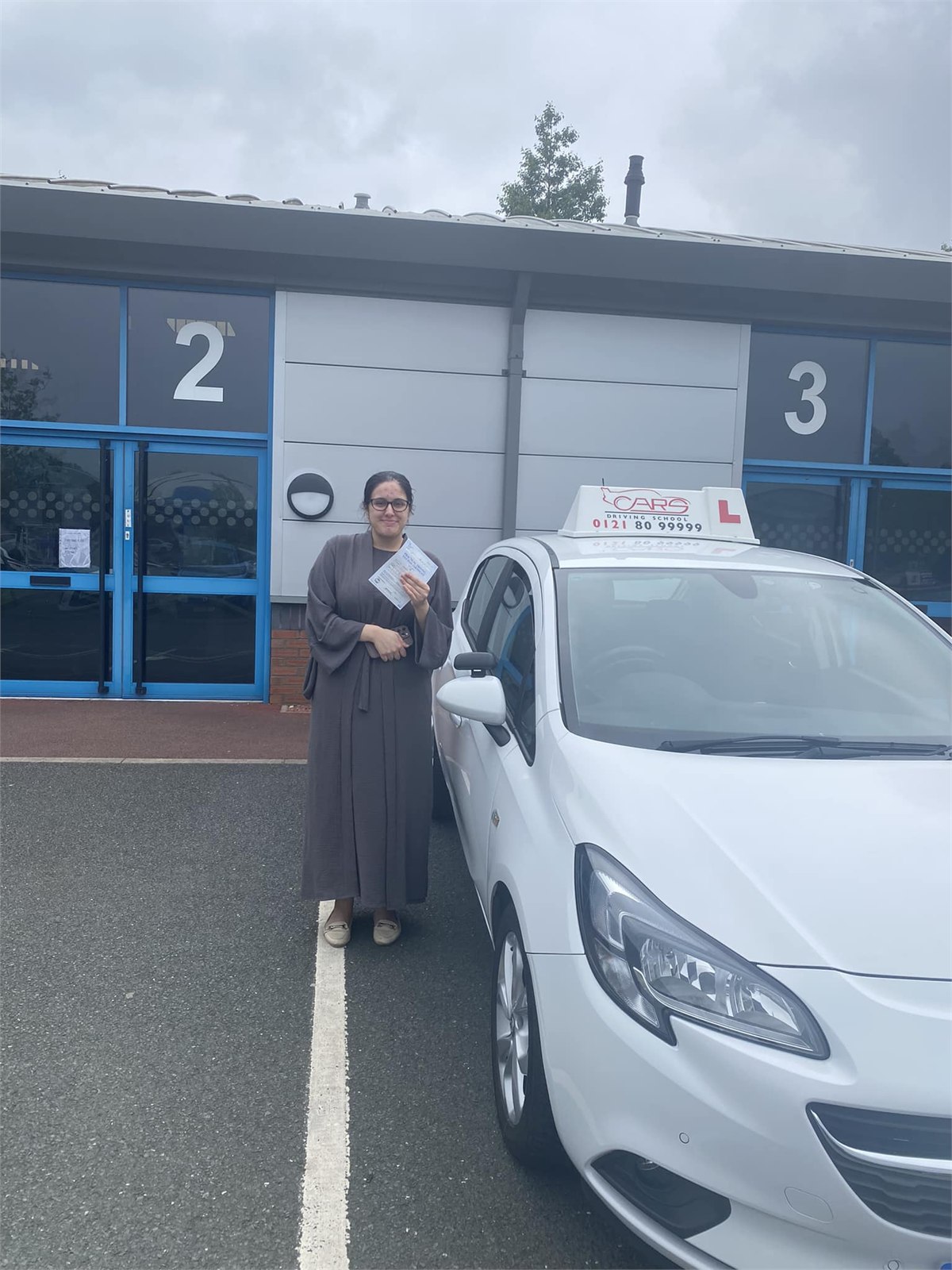 Cars Driving School student celebrating a practical driving test pass