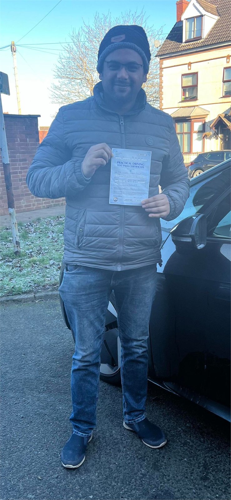 Cars Driving School student celebrating a practical driving test pass