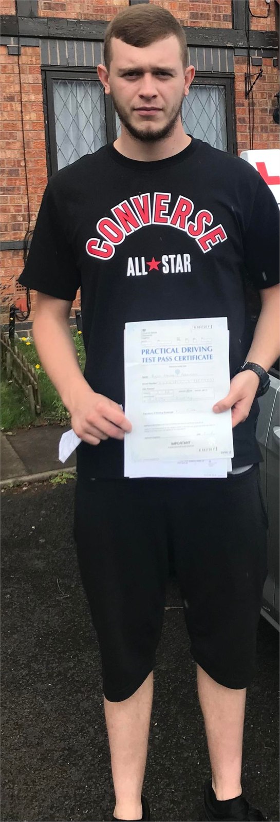 Cars Driving School student celebrating a practical driving test pass