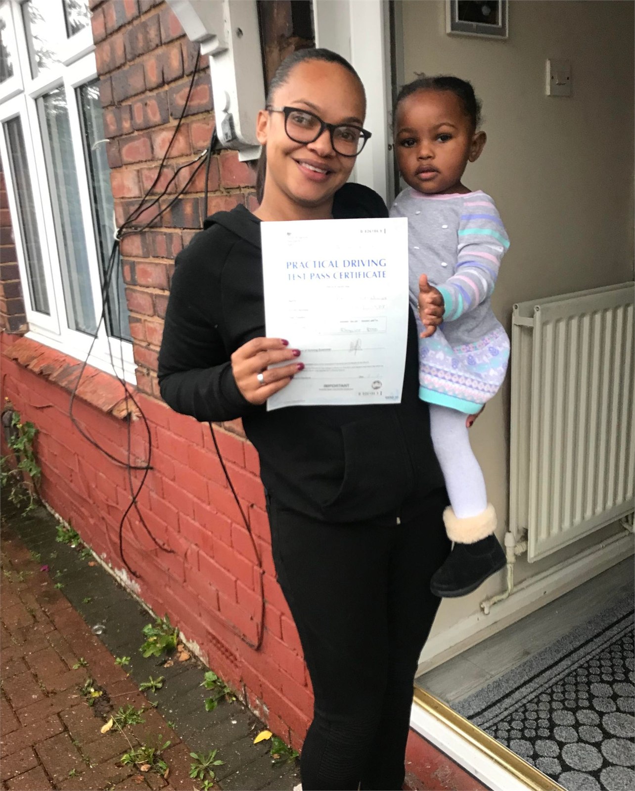 Cars Driving School student celebrating a practical driving test pass