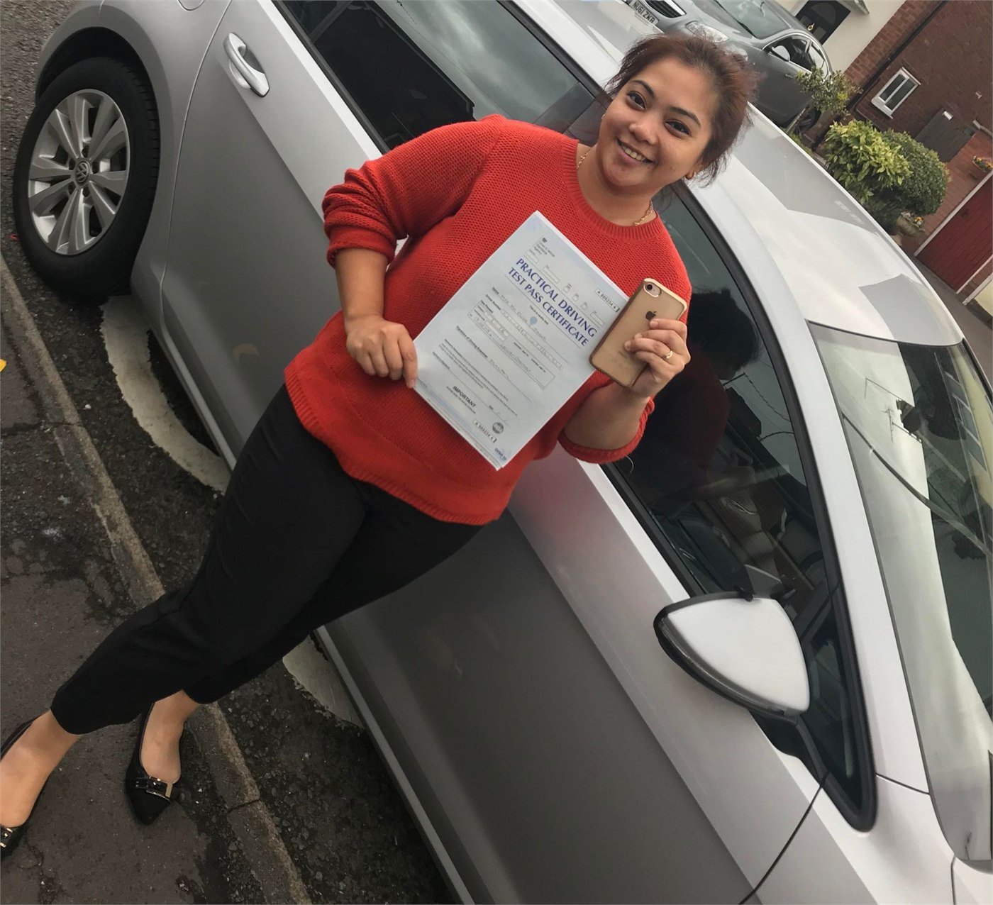 Cars Driving School student celebrating a practical driving test pass