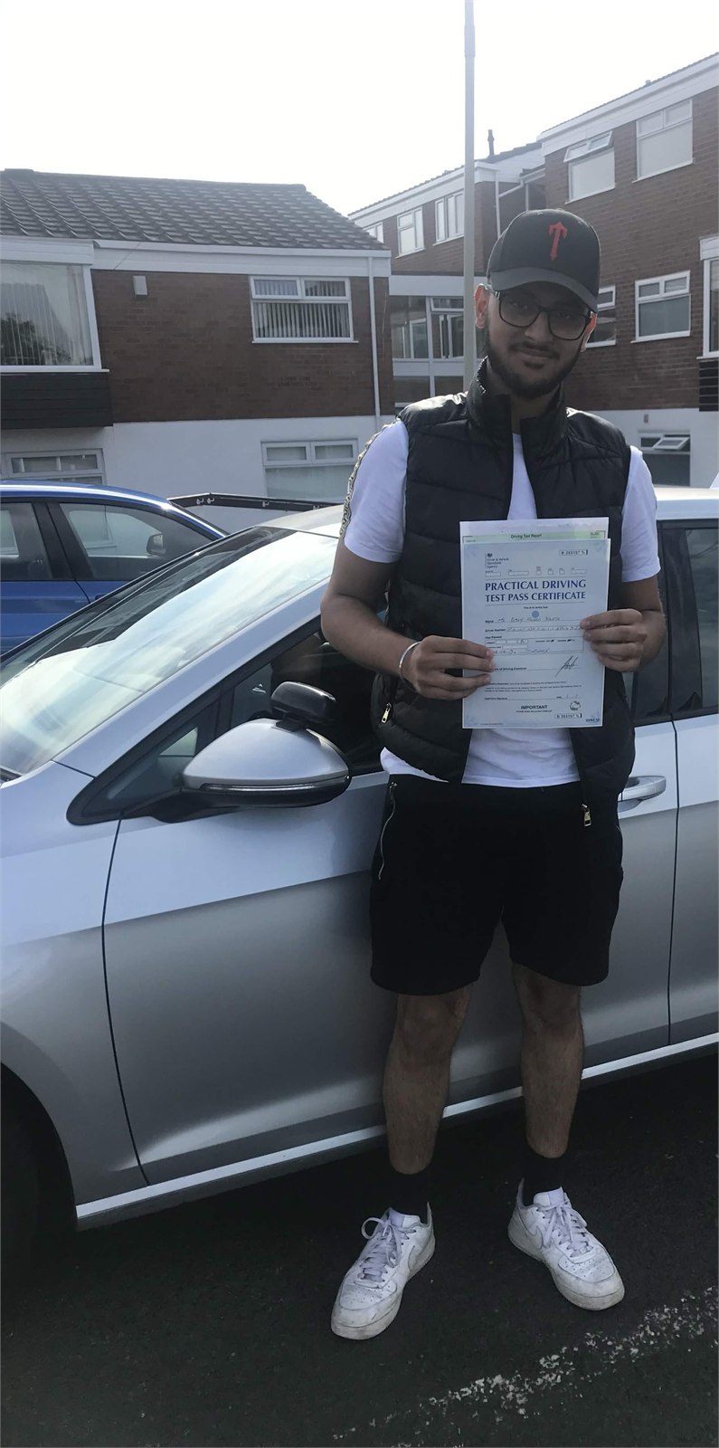 Cars Driving School student celebrating a practical driving test pass