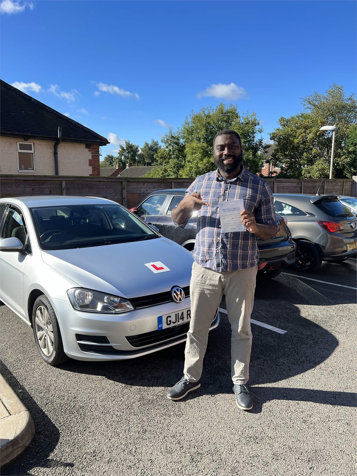 Cars Driving School student celebrating a practical driving test pass