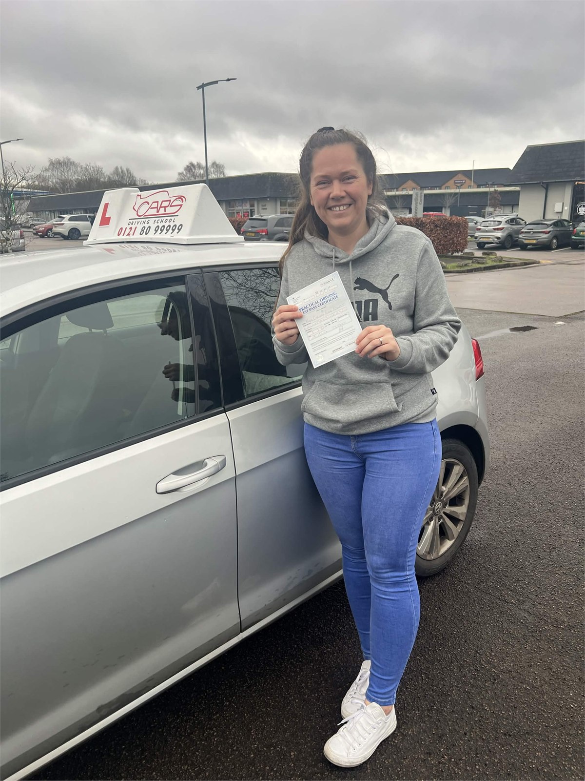 Cars Driving School student celebrating a practical driving test pass
