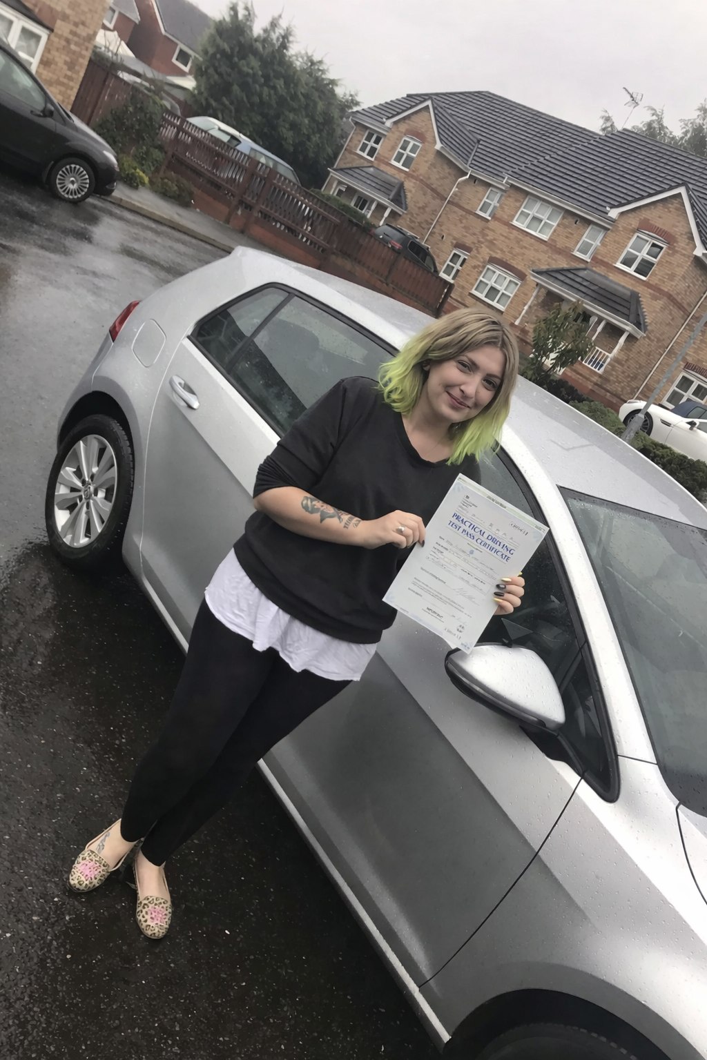 Cars Driving School student celebrating a practical driving test pass